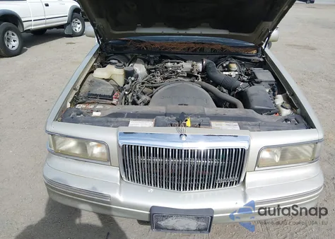 1997 Lincoln Town Car Signature из США, поврежденный, VIN 1LNLM82W9VY739692